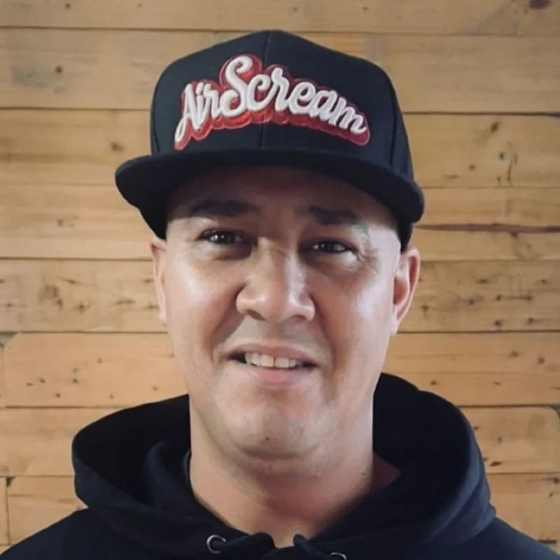 Ikraam Dante at Krem Vape Studio Kuilsriver, offering top-tier vape service with a welcoming vibe.